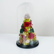 高大的玻璃穹頂永恆聖誕樹混合花卉