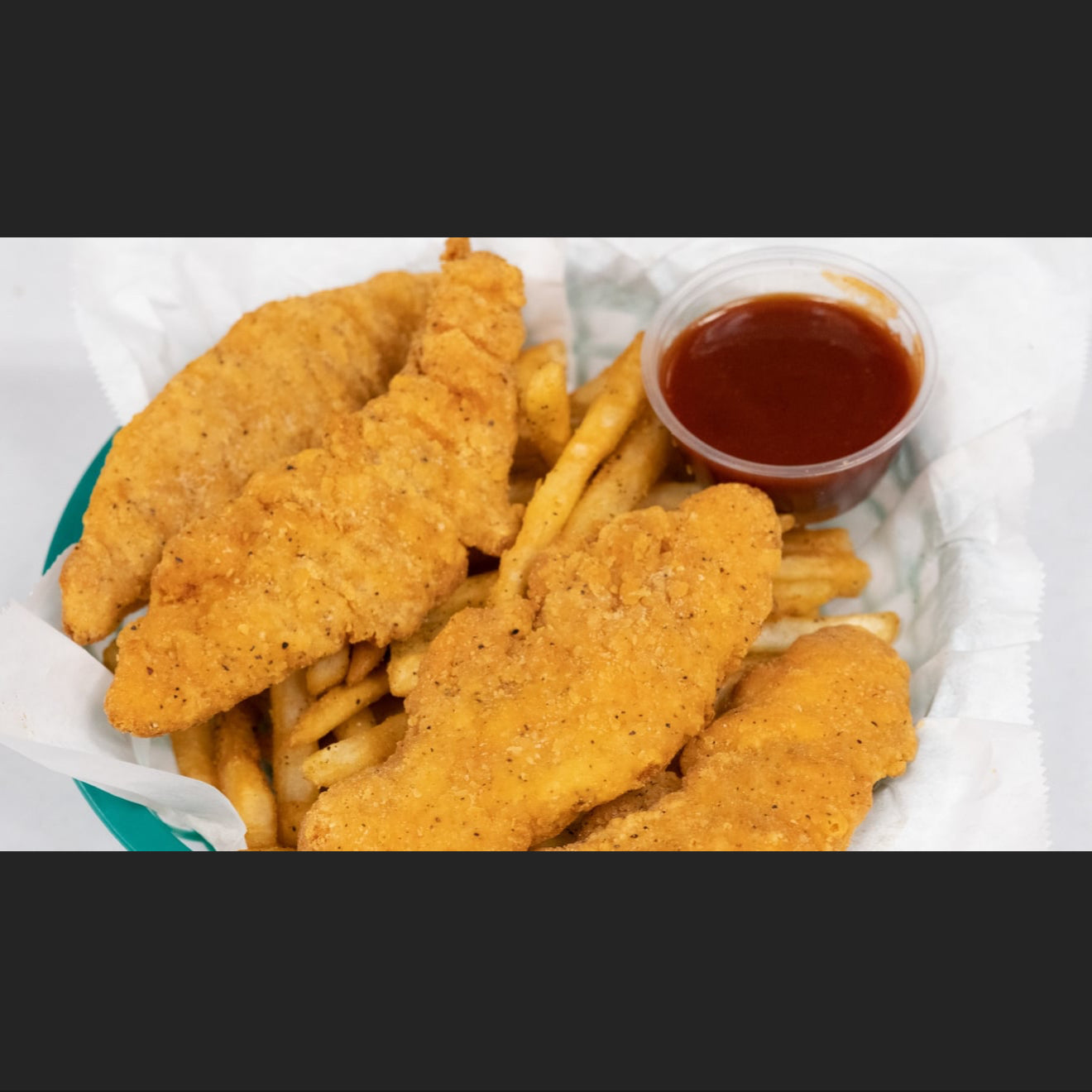 Chicken Tenders Basket with Cajun Fries
